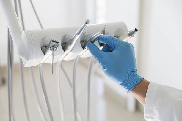 Professional Dental Implants technician working in Lowell, AR